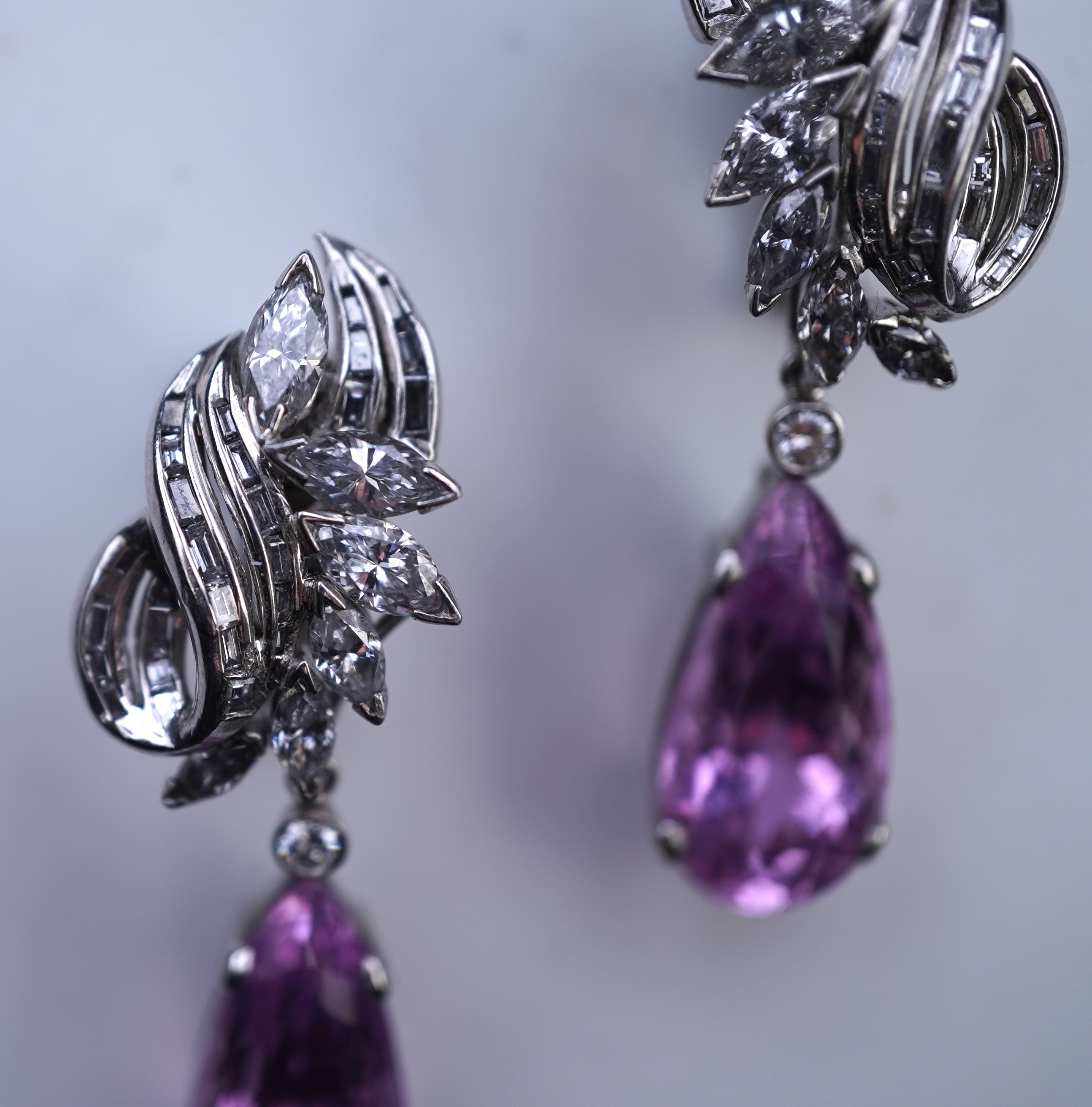 An attractive pair of 'day and night' kunzite and diamond ear clips